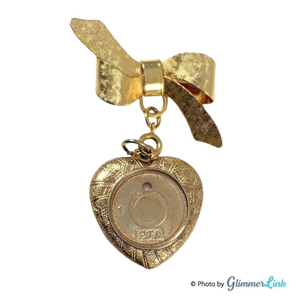 Vintage Gold Tone Bow Brooch with Dangling Heart Photo Frame Charm – Mid Century
